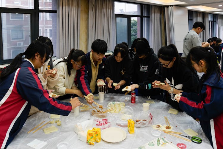 People Making Dumplings