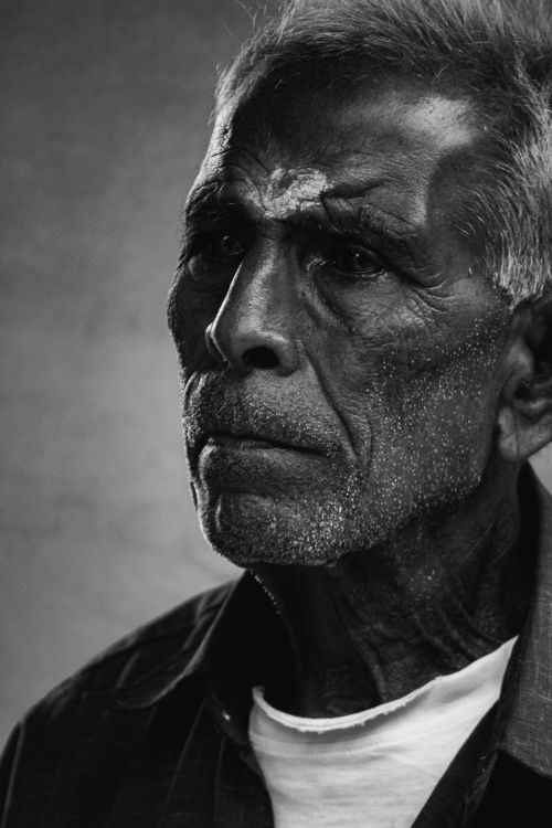 Free Striking black and white portrait of an elderly man conveying deep emotions. Stock Photo