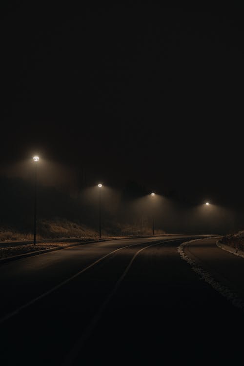 Illuminated Road at Night