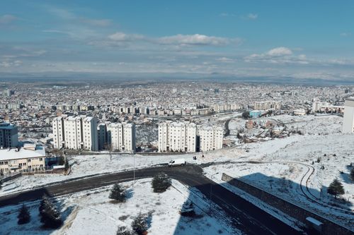 Free A stunning aerial shot of Malatya, Türkiye, revealing its snow-covered buildings and landscape. Stock Photo