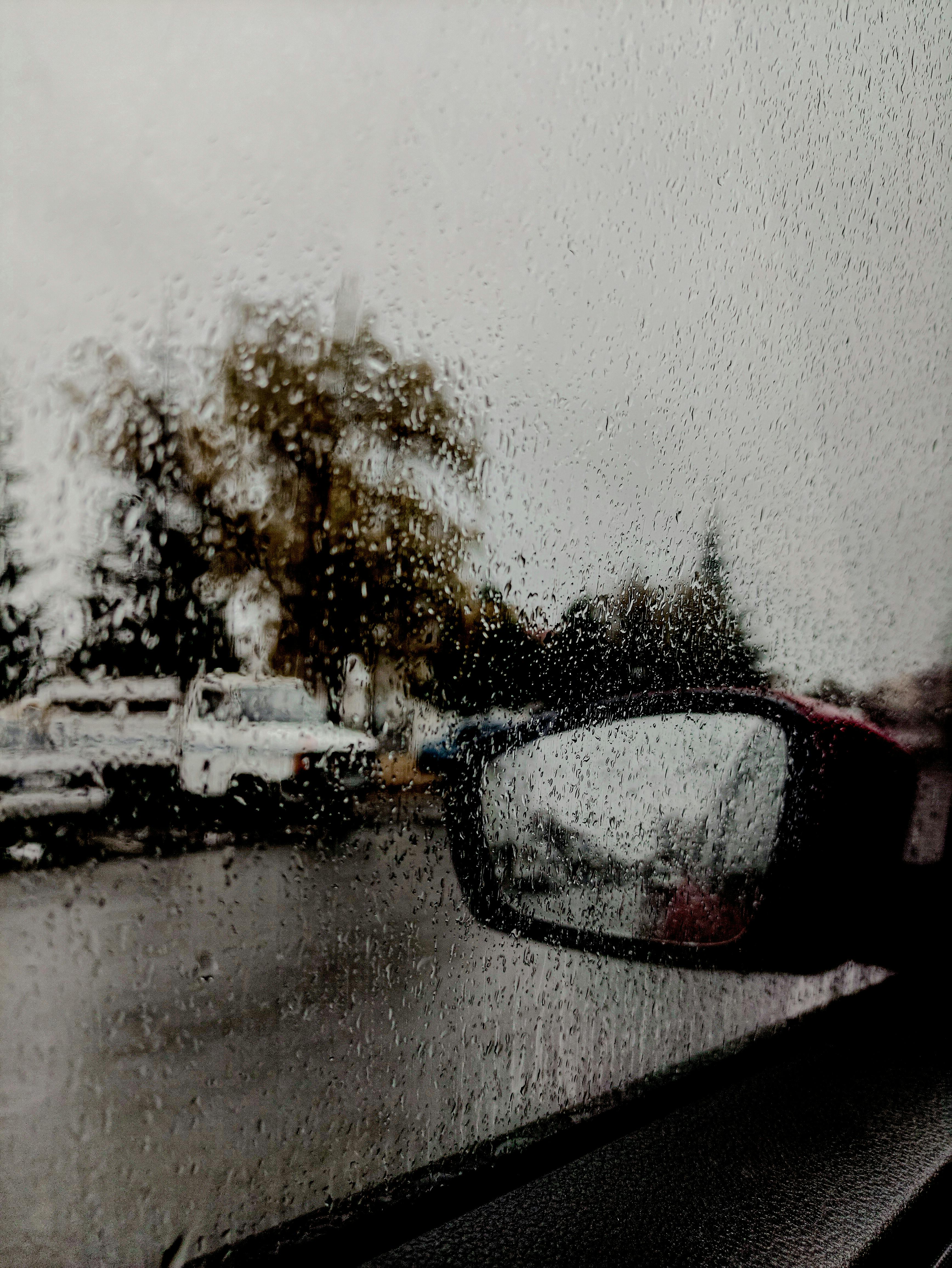 Rain Drops on a Car Window · Free Stock Photo