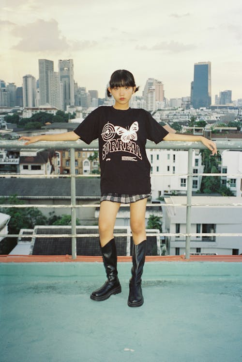 Woman in Black T-shirt in City