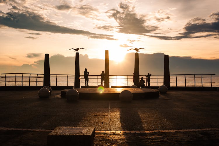 Silhouette Of The Birds On Pedestals At Morib Beach In Banting, Selangor, Malaysia