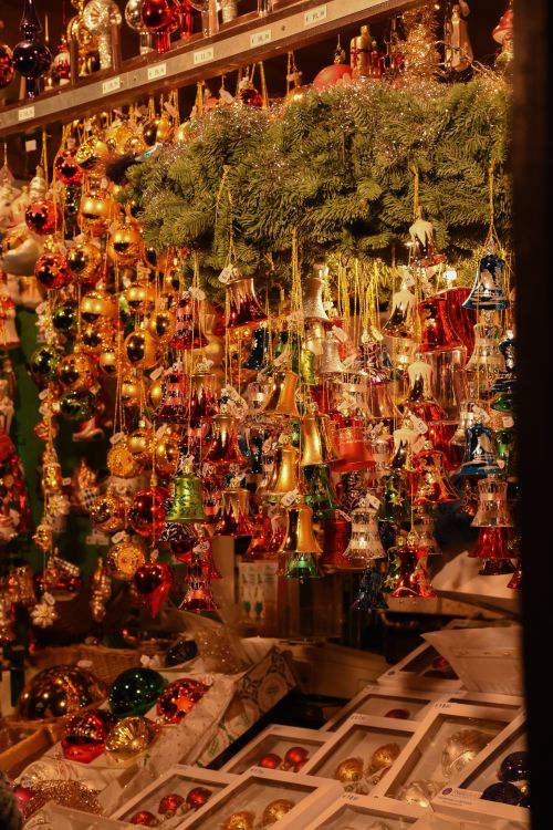 Free Vibrant Christmas ornaments and bells on display at a market in Munich, Germany. Stock Photo