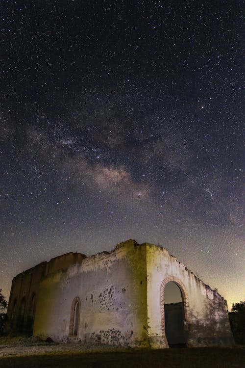 Stars on Clear Sky over Building Ruins