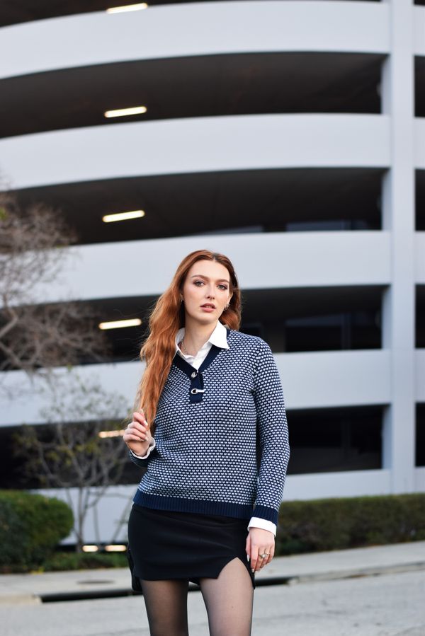 Cobalt blue knit sweater with black leggings