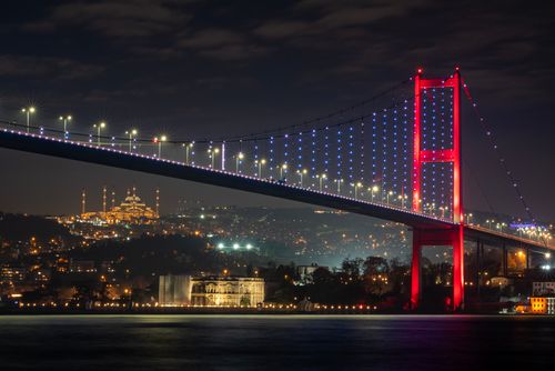 Free Vibrant night scene of the illuminated Bosphorus Bridge in Istanbul, Turkey. Stock Photo