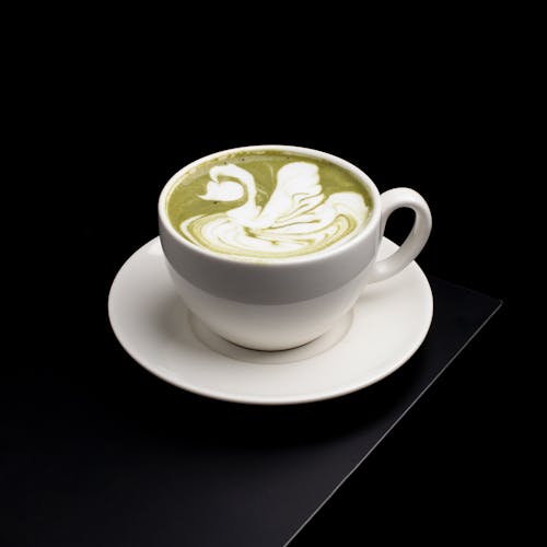 Free A Hot Matcha Latte on White Ceramic Cup Stock Photo