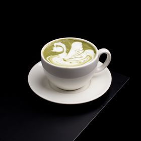 Green latte with swan latte art, photo by mohammad khorram on Pexels