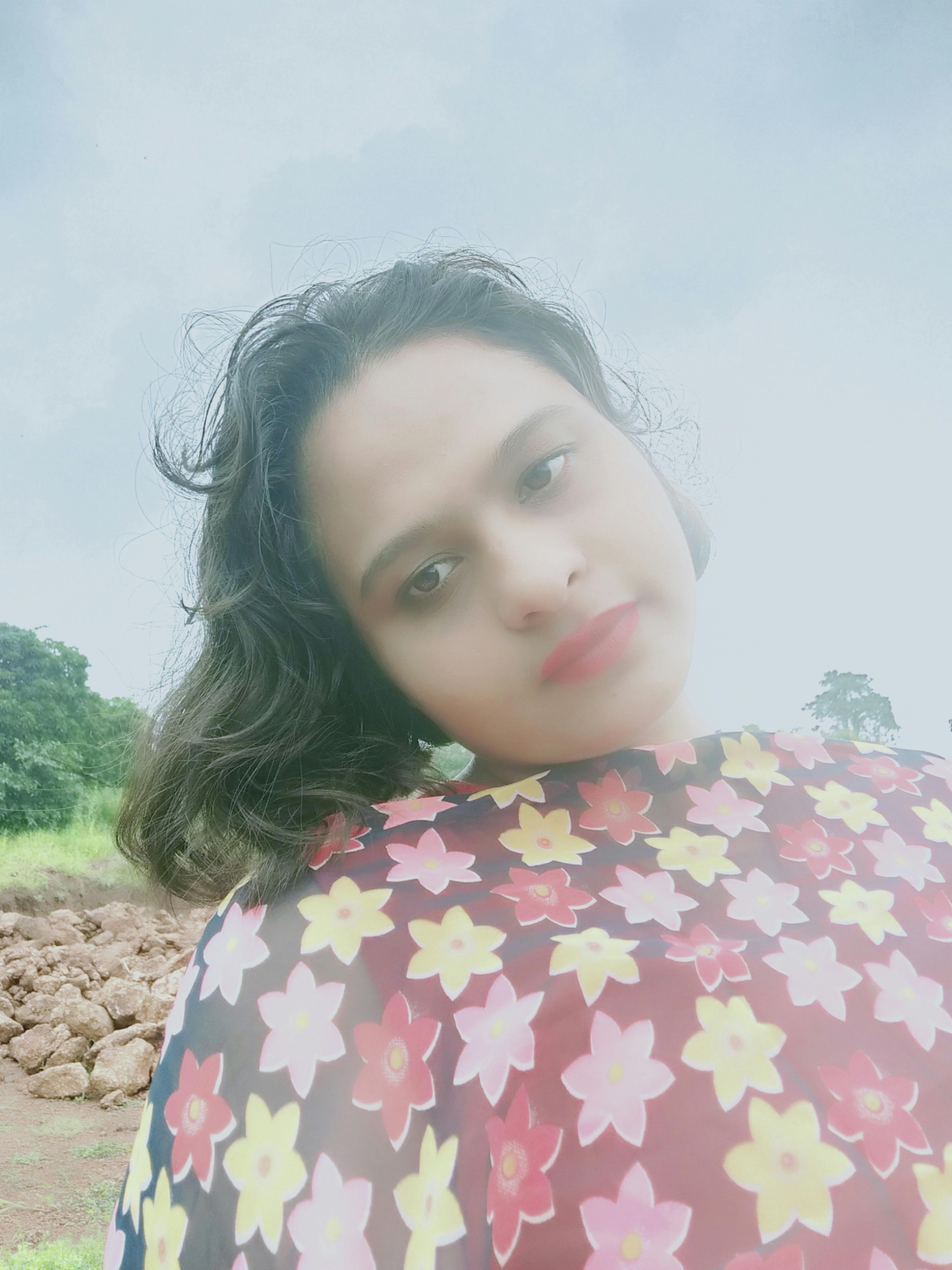 Close-up of iced coffee in a glass with metal straw on a table