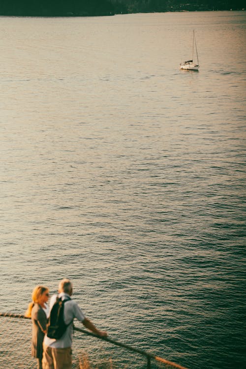 Aerial View of a Couple on a Pier 