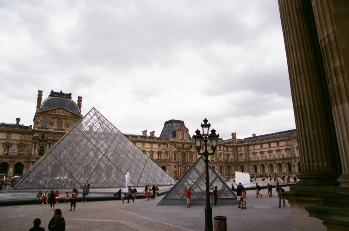 Glass pyramid in the Napoleon Courtyard of the Louvre Museum, Paris
