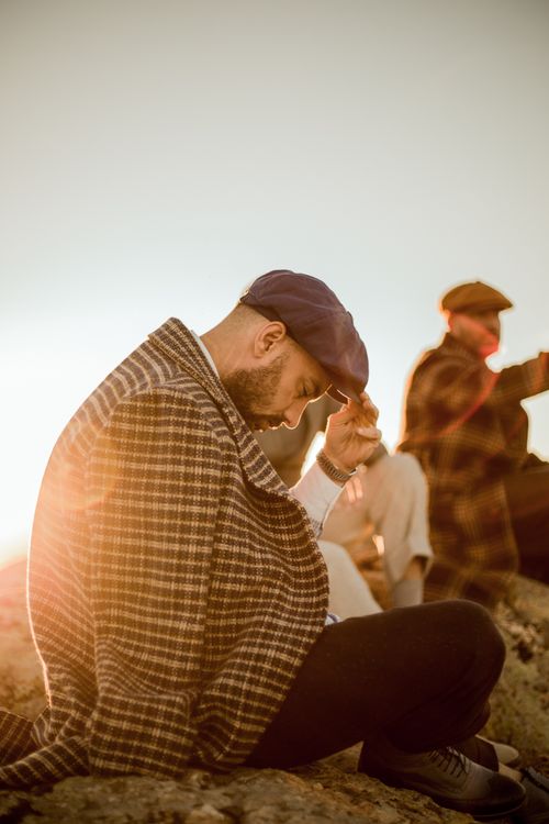 Free Fashionable men in Göreme, Türkiye enjoying the serene sunset. Elegant menswear in a beautiful natural setting. Stock Photo