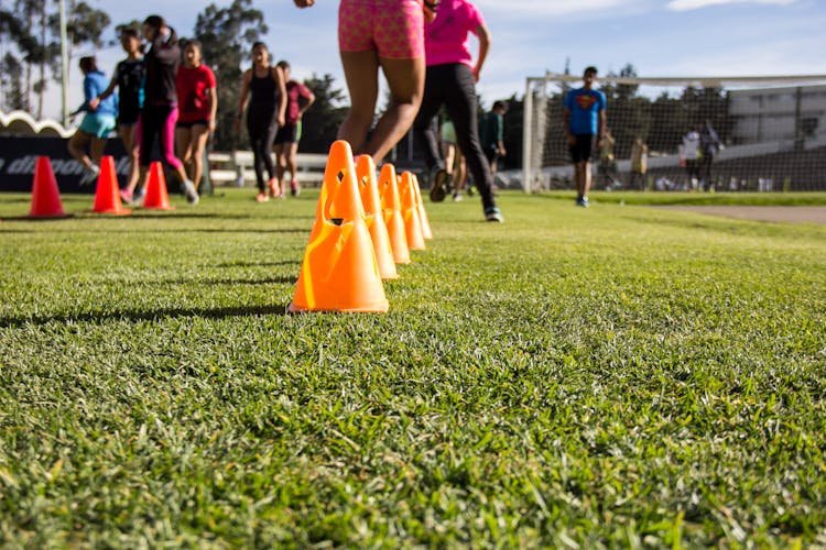 Photo Of Teenagers Training On A Football Pitch