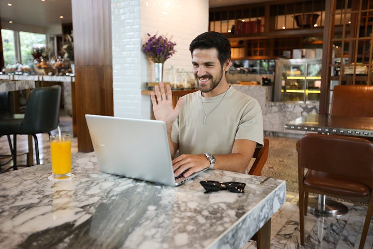 A Man Using Laptop