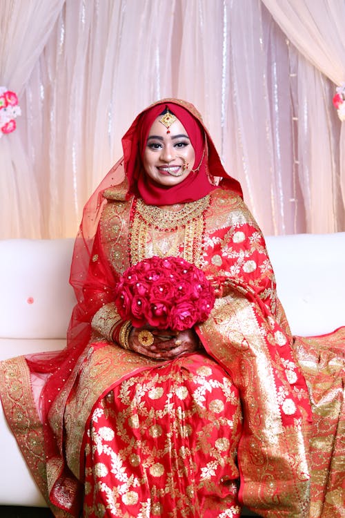 Smiling Woman in Traditional Wedding Dress