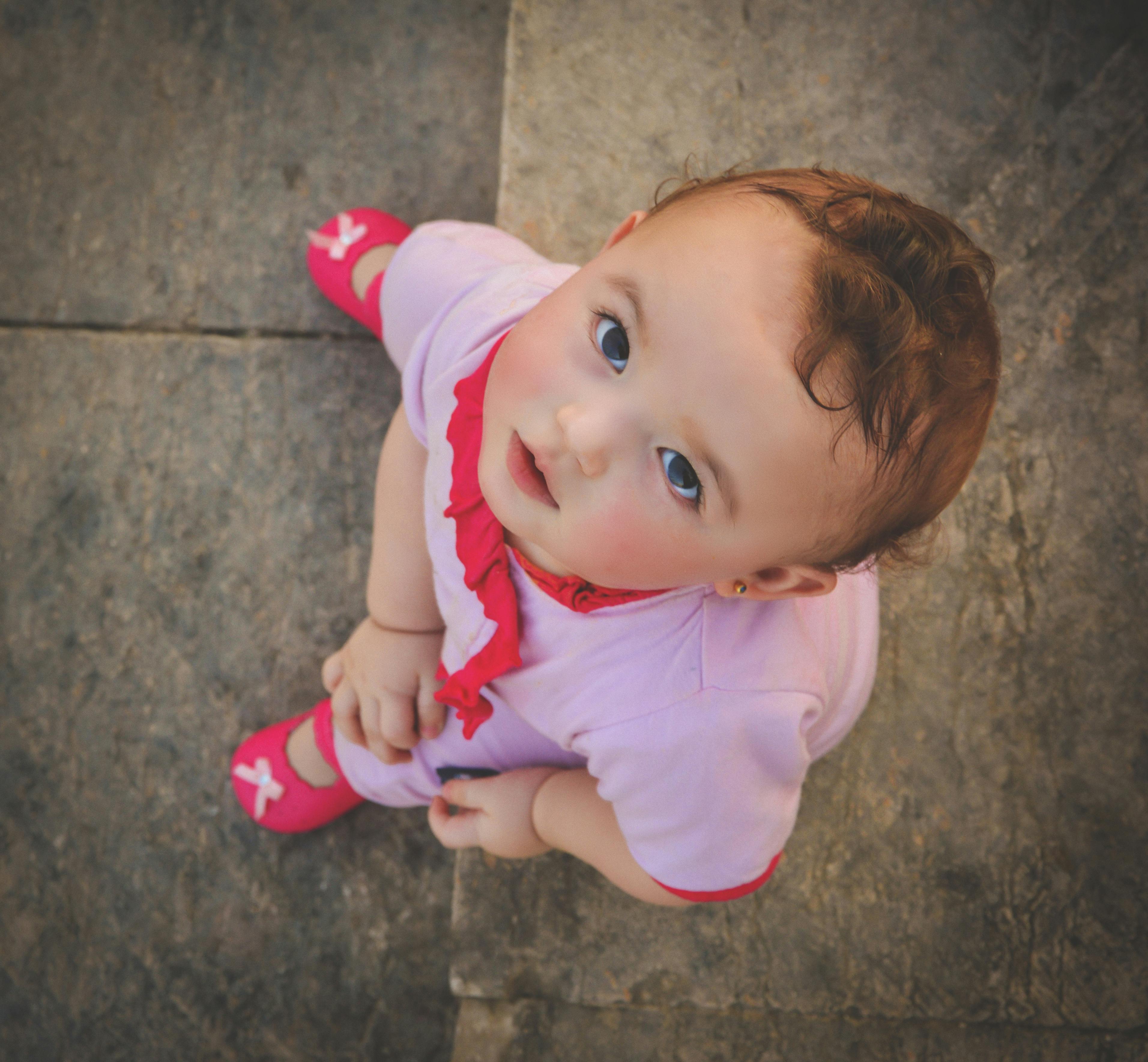 girl in pink and red shirt and pants