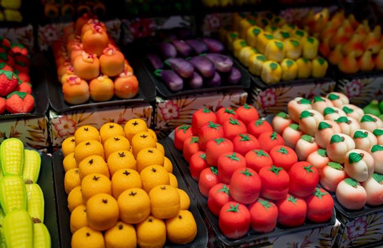 Close Up Of Colorful Sweets In Shapes Of Fruit And Vegetables