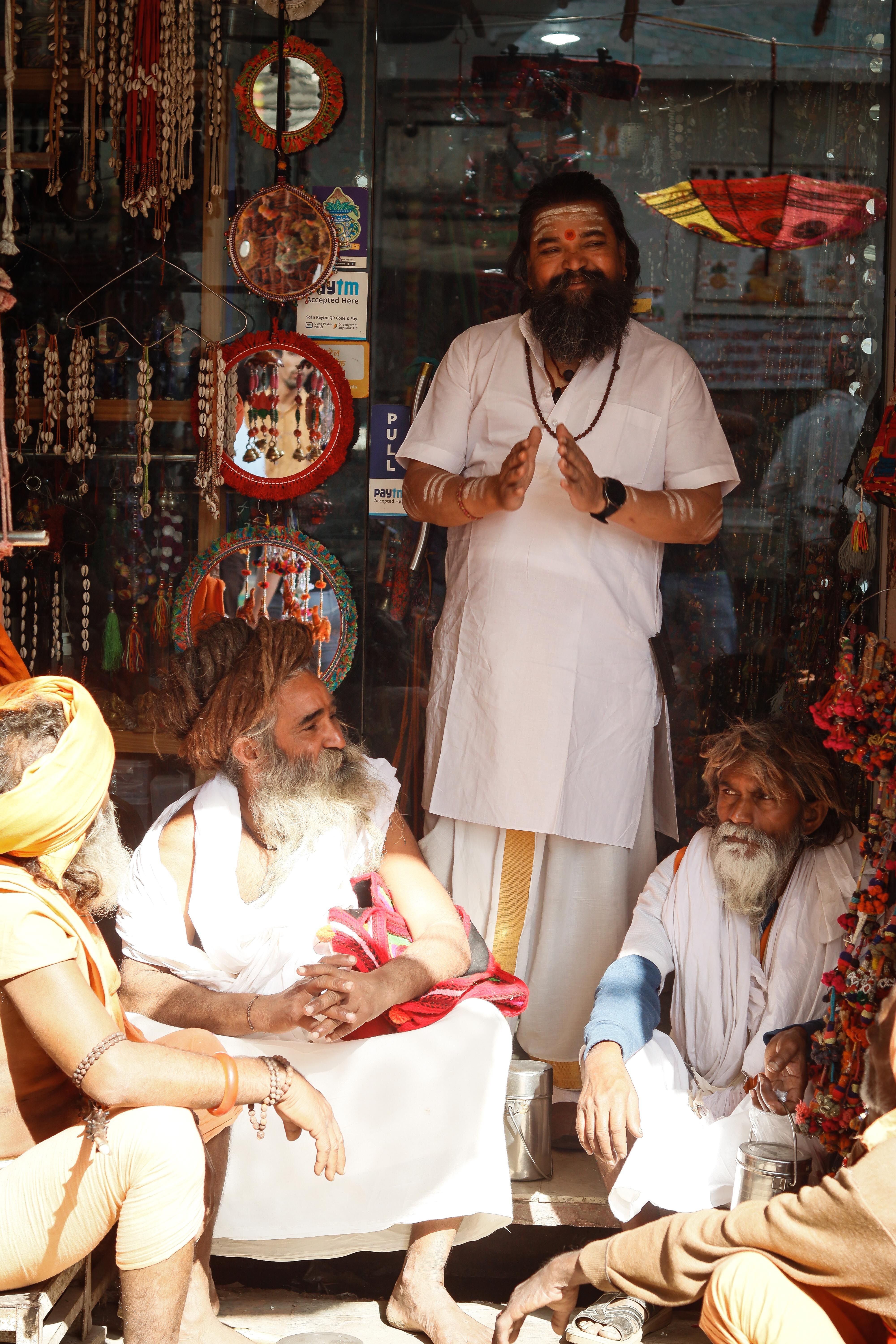 Old Bearded Men in Traditional Clothes in Shop · Free Stock Photo