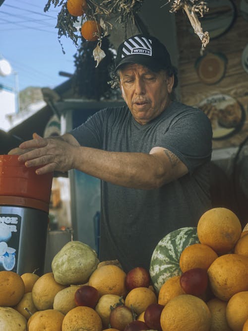 Photo of a Street Vendor Selling Fruit