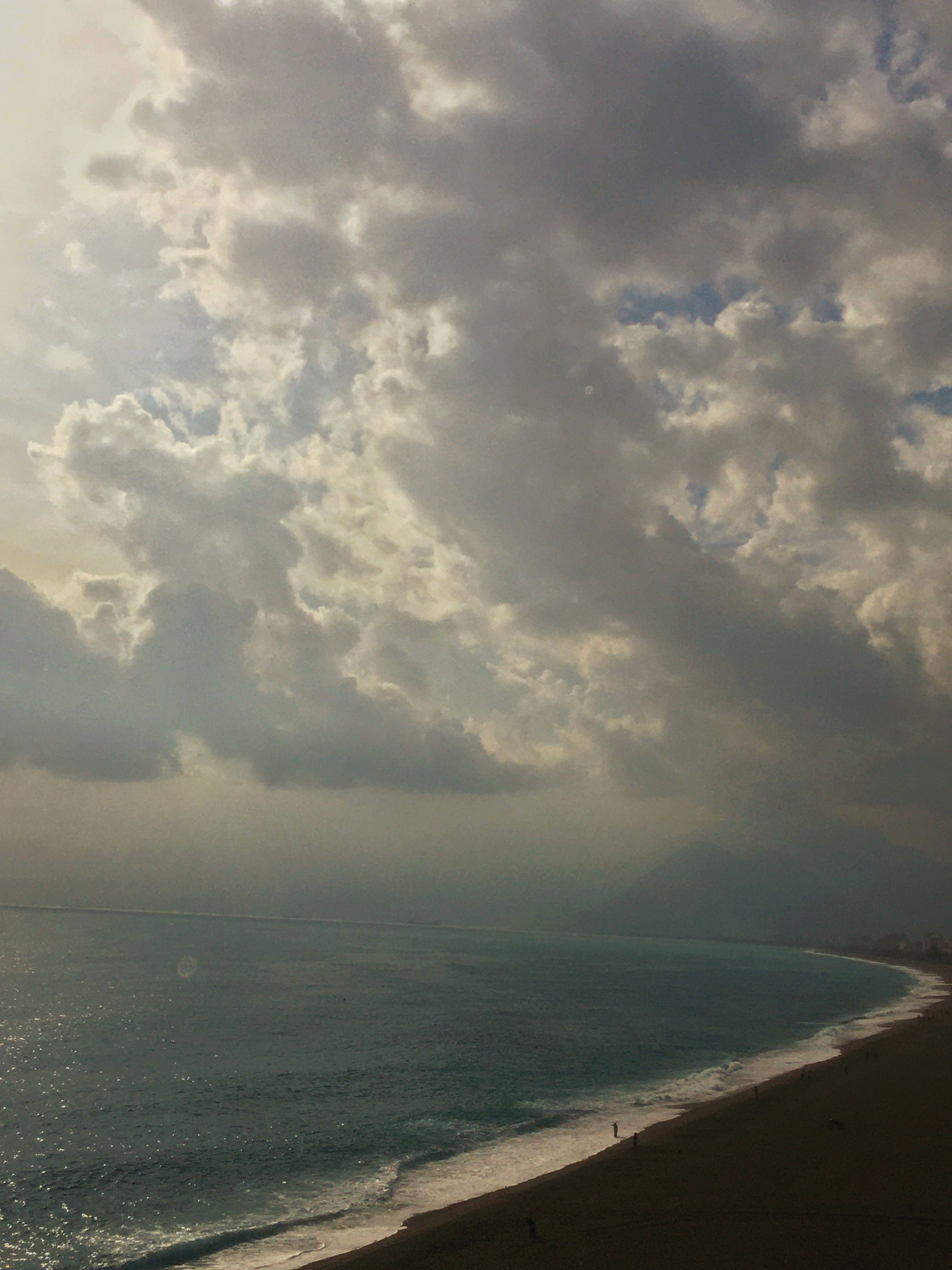Aerial View of Beach under Cloudy Sky · Free Stock Photo