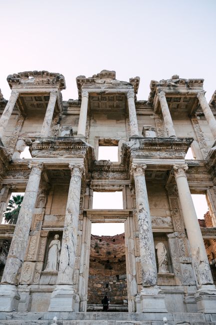 Vertical shot of the ancient Library of Celsus facade in Ephesus, Turkey, featuring grand columns and historic architecture.