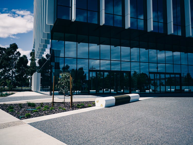 Bench Outside Modern Glass Building