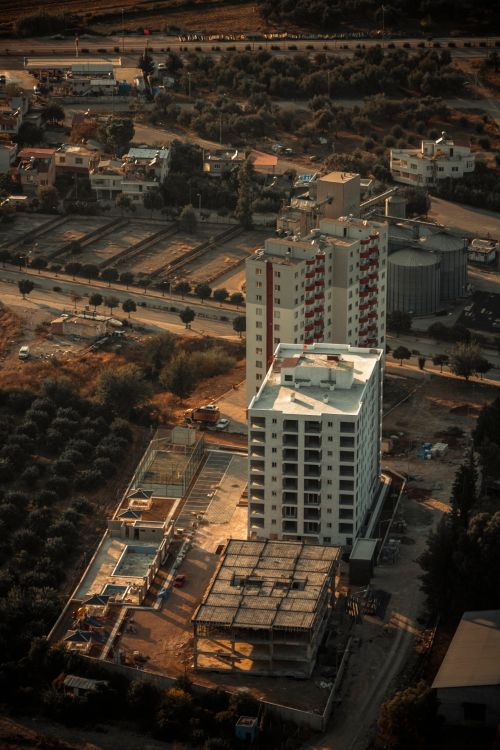 Free Aerial shot of residential buildings and construction in Kozan, Turkey, during daytime. Stock Photo