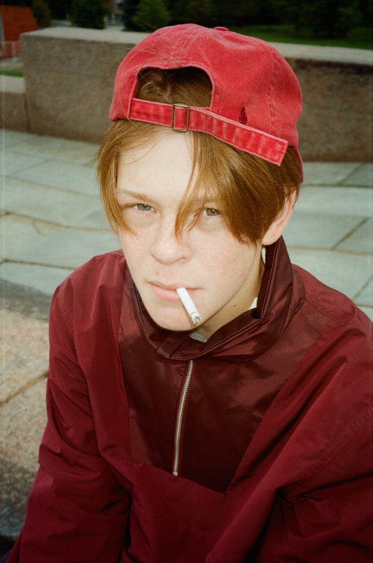 Young Man Smoking A Cigarette 