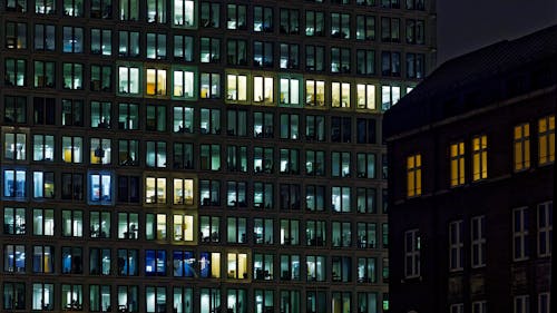 Illuminated Windows of an Office Building in City 