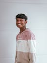 Portrait of a Smiling Boy on White Background