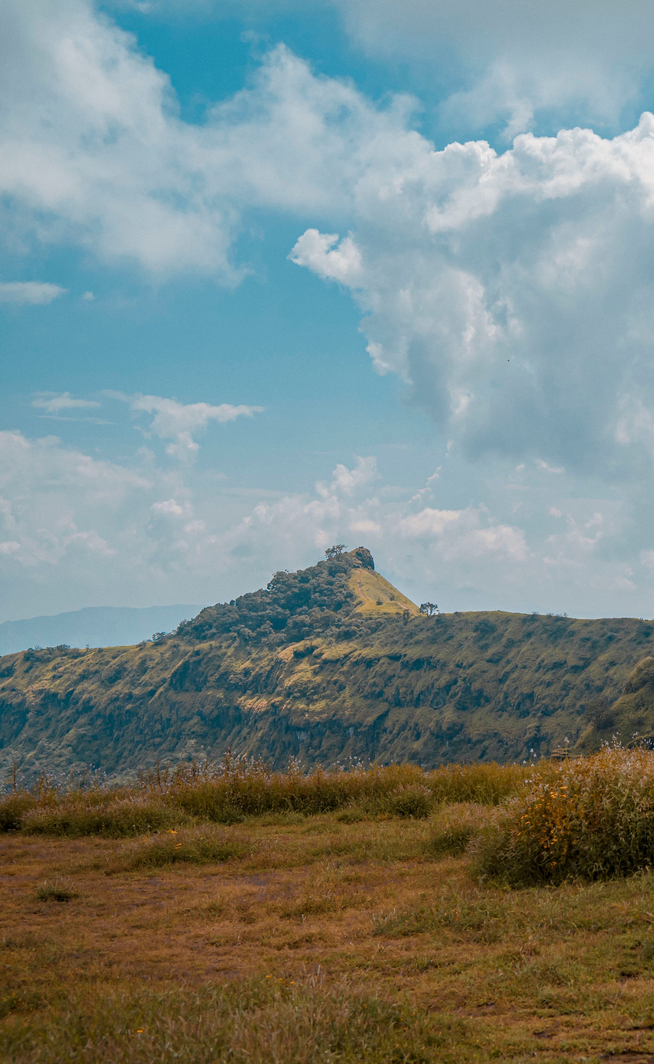 Green Mountain under Blue Sky and White Clouds · Free Stock Photo