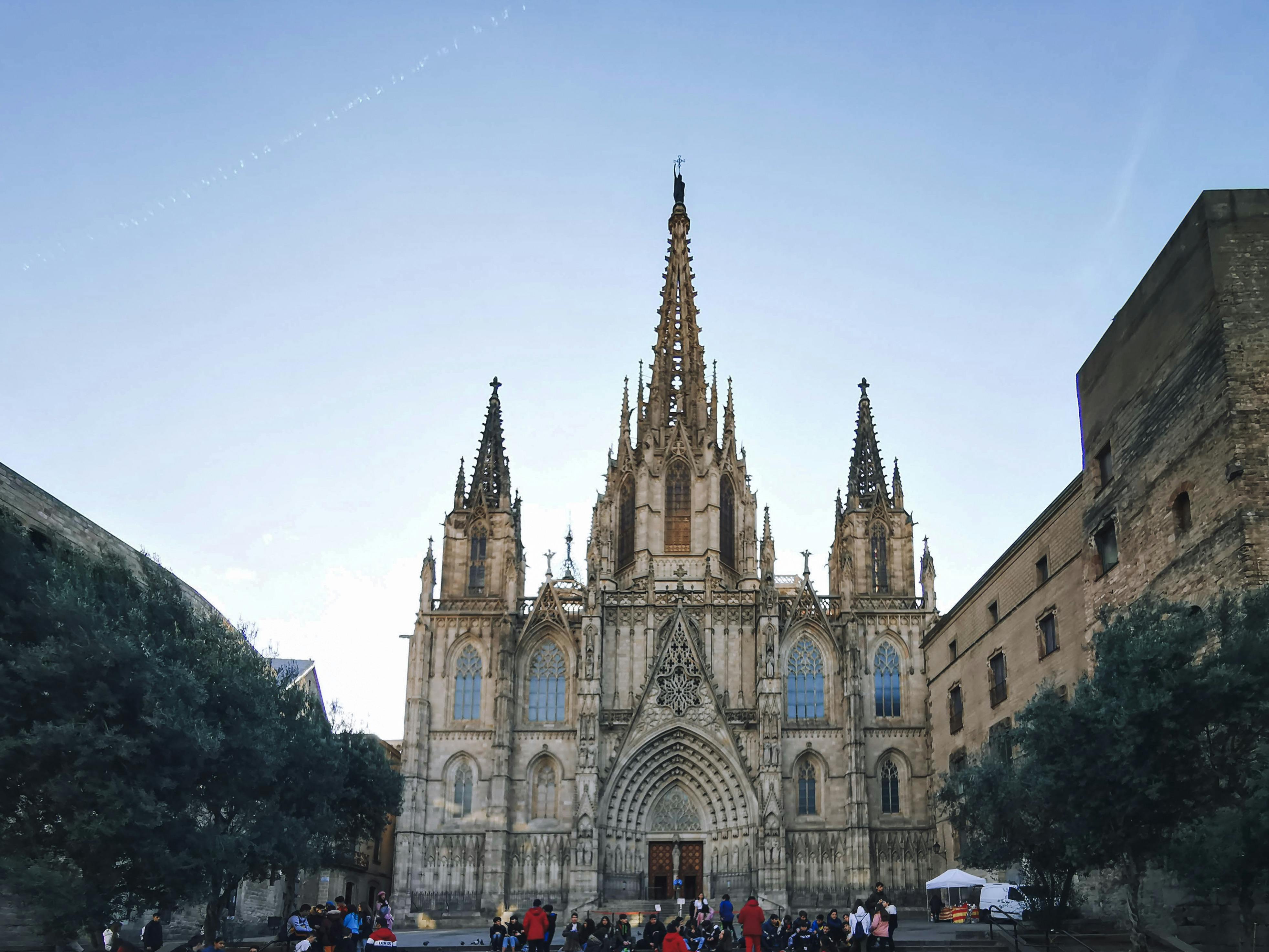 cathedral of barcelona under blue sky