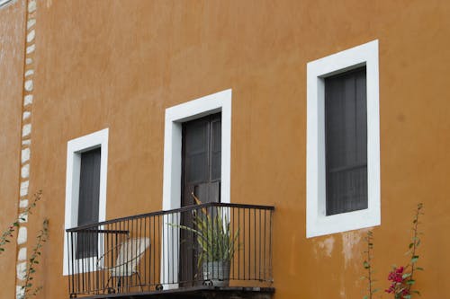 Brown Building with a Balcony