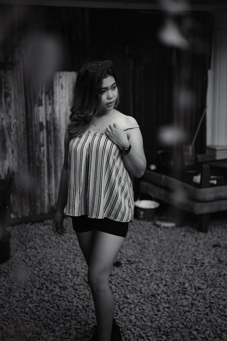 Grayscale Photo Of Woman In Stripes Top And Shorts 