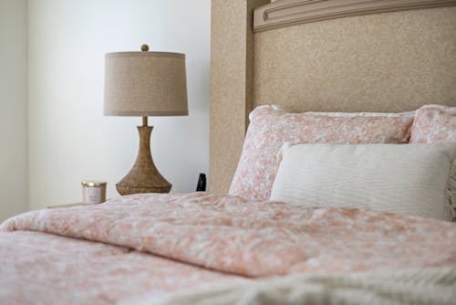 Free Lamp by Hotel Room Bed Stock Photo
