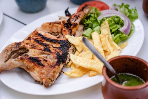 Meat and Fries on White Plate