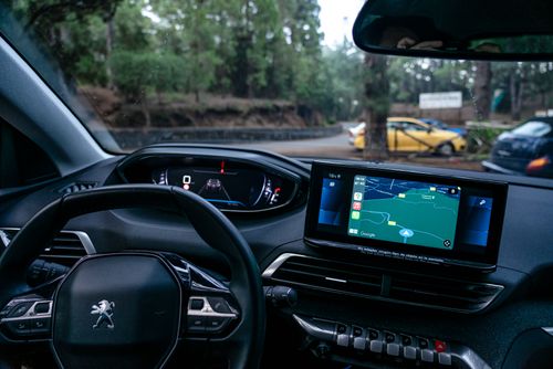 Free Sleek car interior showing advanced navigation system and dashboard details. Stock Photo
