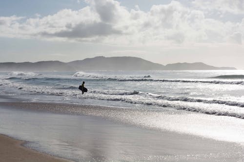 Ingyenes stockfotó bodyboard, cipelés, felhős ég témában