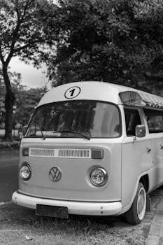 Classic Volkswagen van parked on a street in Yogyakarta, Indonesia. Black and white shot.
