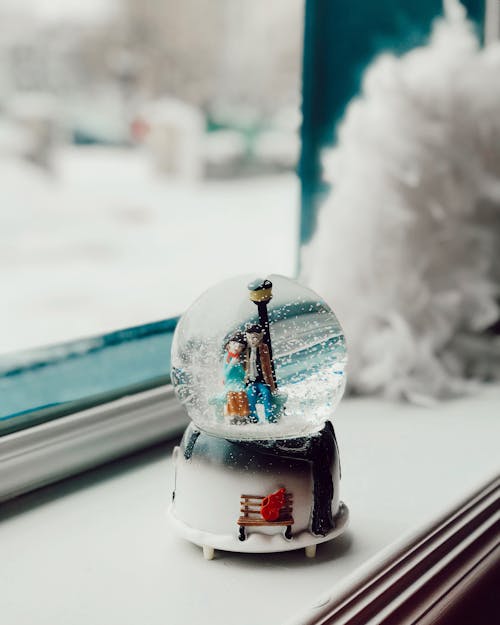 Snow Globe on Windowsill