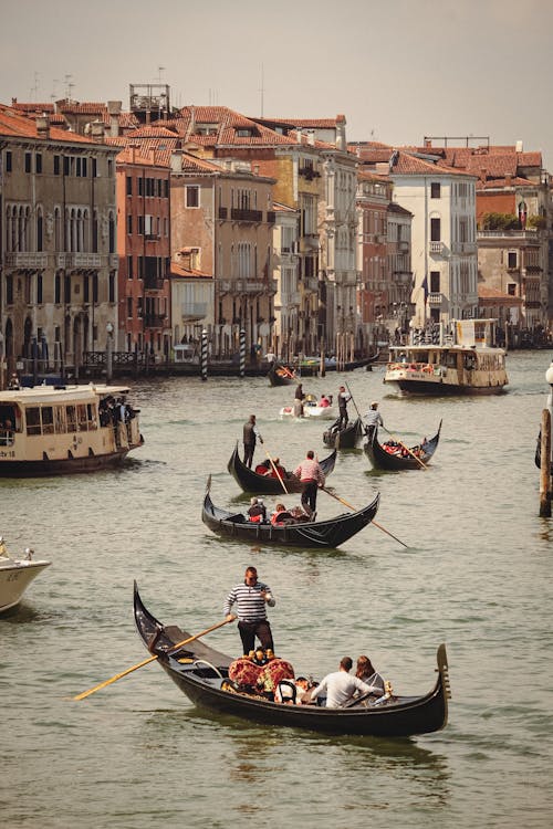 Gondolas and Boats on Canal in Venice