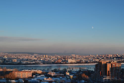 A River Between City Buildings 