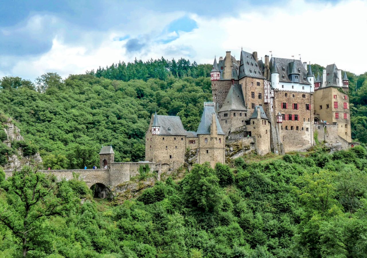 stunning aerial view of the medieval eltz castle nestled in the lush l