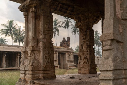 Free Carved Columns in Ancient Temple Stock Photo