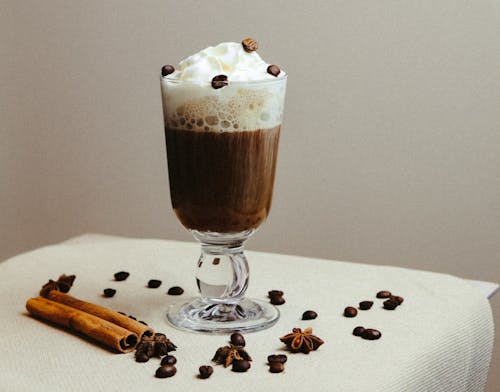 Coffee with Whipped Cream in a Glass Mug 