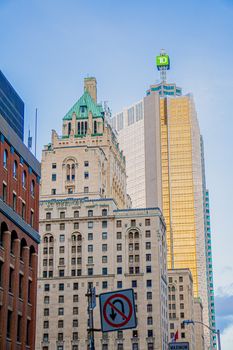 Stunning view of Toronto's architectural landmarks, including the Royal York Hotel and modern skyscrapers.
