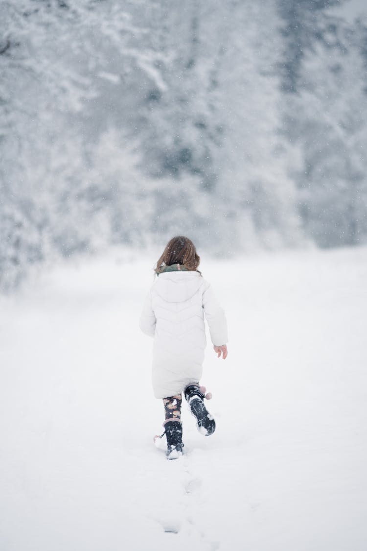 Girl Running On Snow