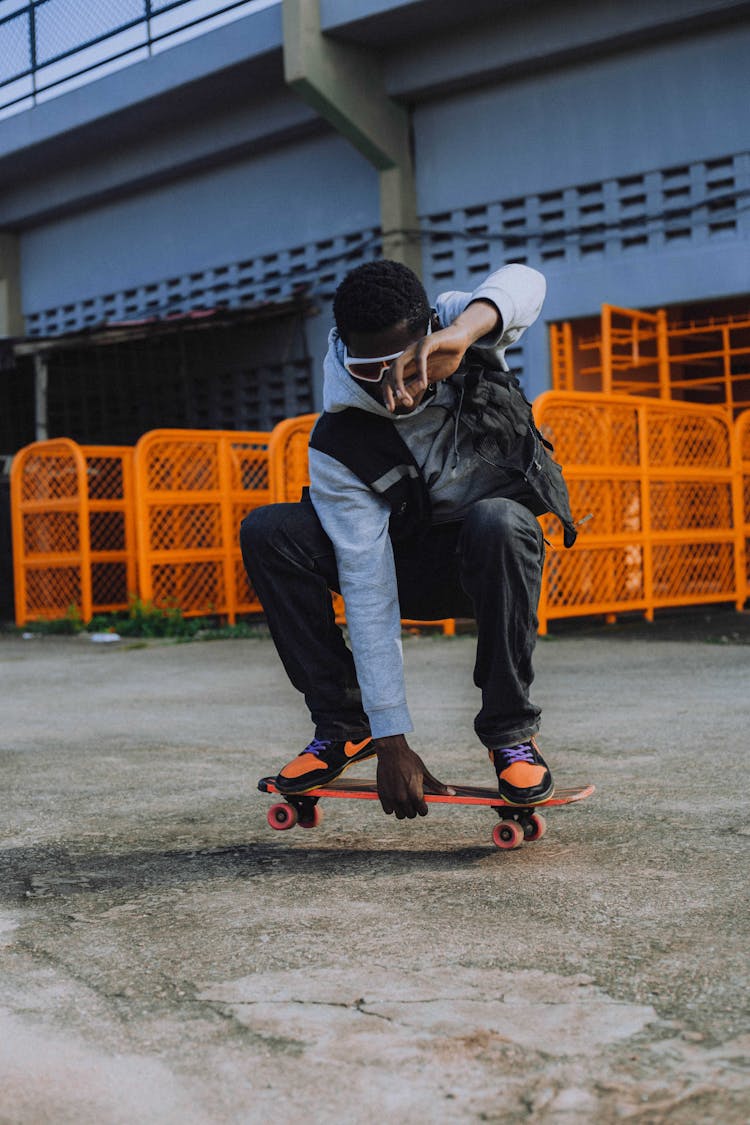 Photo Of A Man Skateboarding 