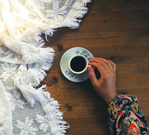 Free Hand Holding a Cup of Coffee Stock Photo